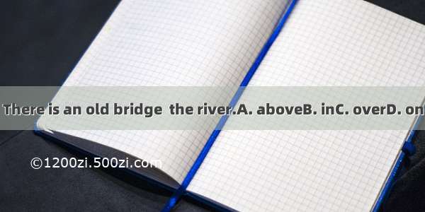 There is an old bridge  the river.A. aboveB. inC. overD. on